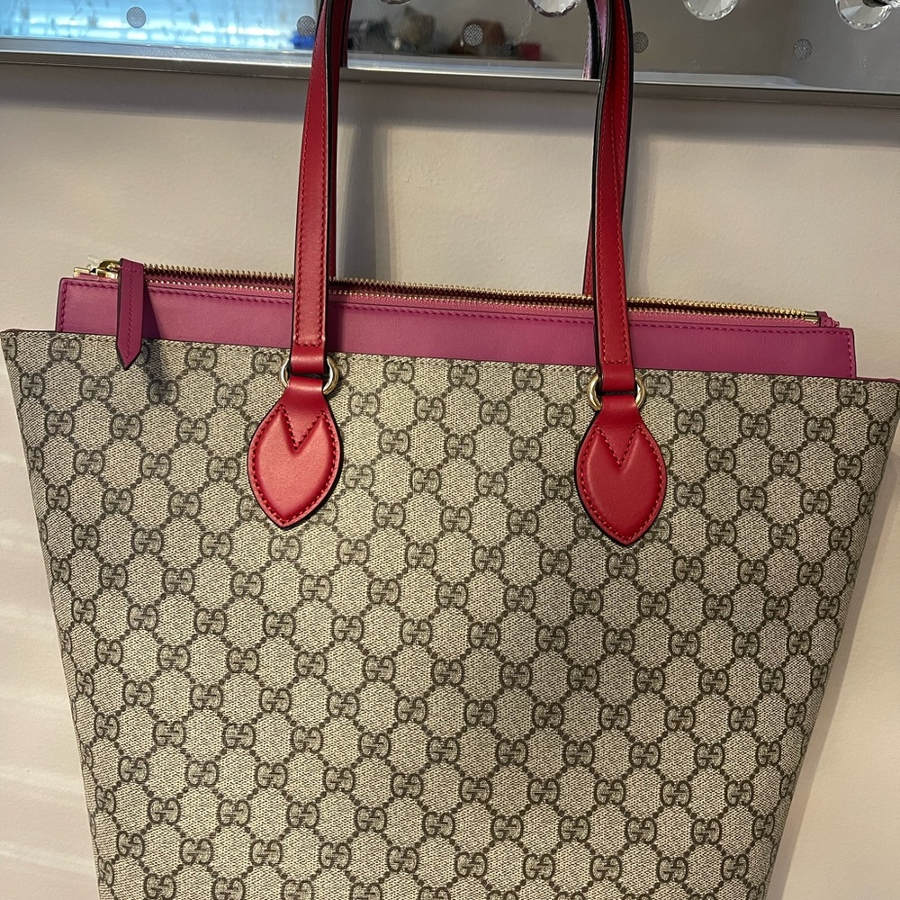 Gucci bag, brand new, you’ll save the tax too